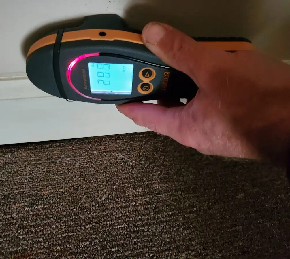Moisture detection at baseboard during Sewage Cleanup & Sanitation in Pawtucket